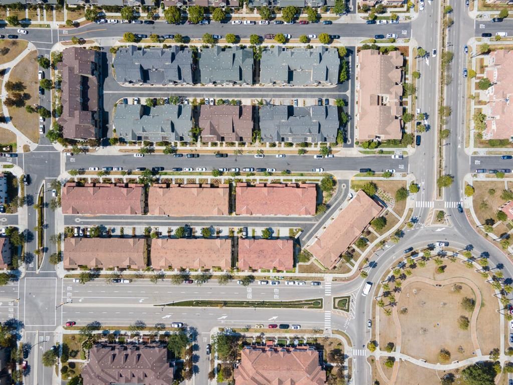 a birdseye view of a parking lot in a residential area at The Vines at Riverpark, LLC, Oxnard, CA