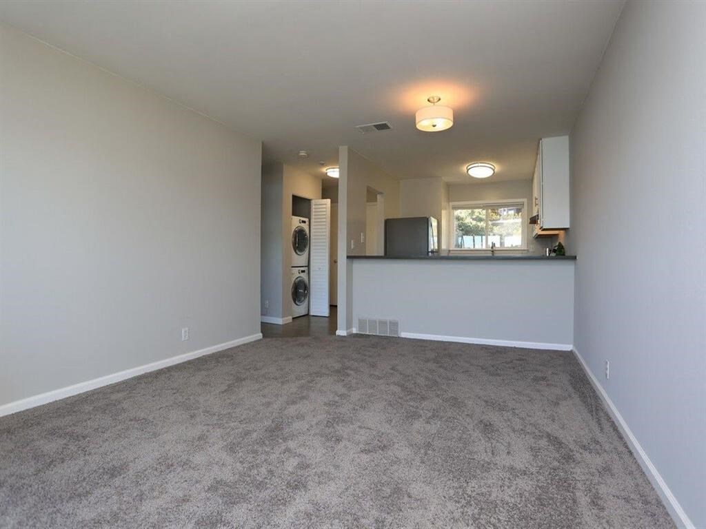 a living room with a couch and a table in a house at The Pier at Sausalito, California, 94965
