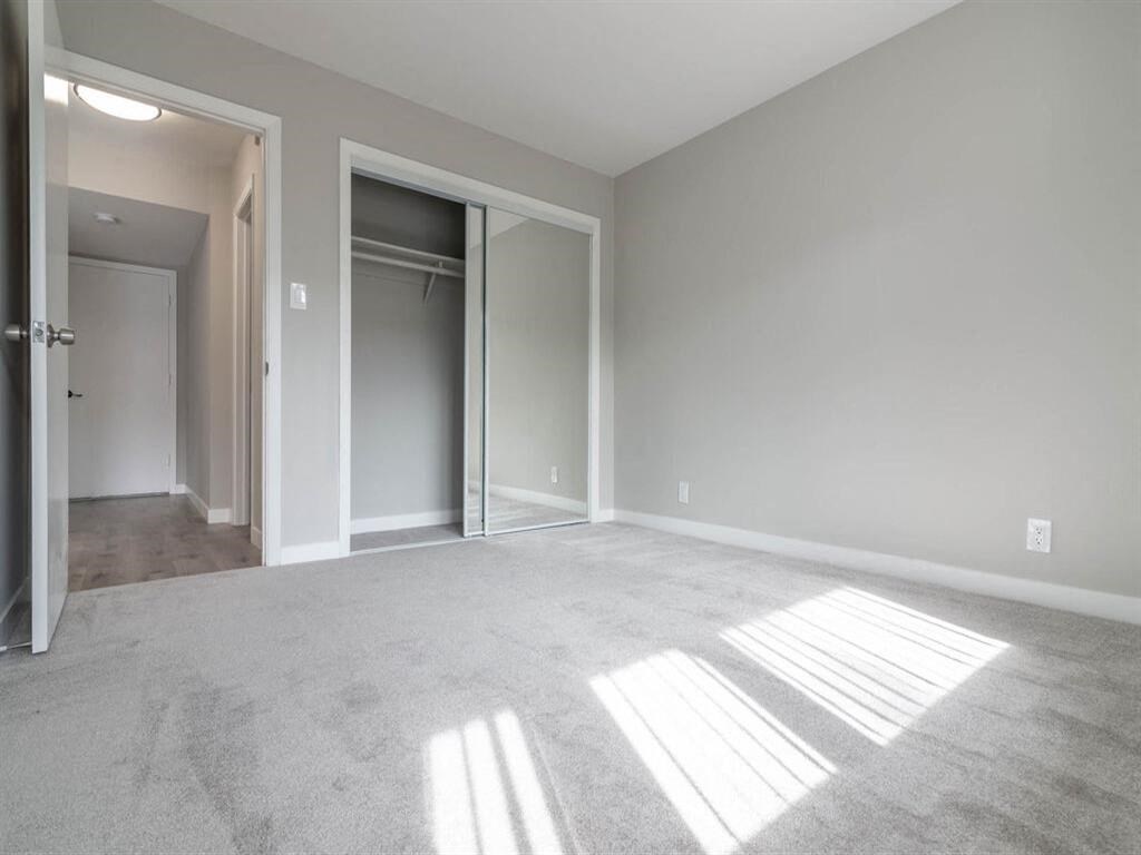 an empty living room with the door open to a closet at The Pier at Sausalito, Sausalito, CA