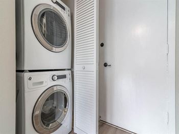 a washing machine and a dryer in a closet at The Pier at Sausalito, Sausalito