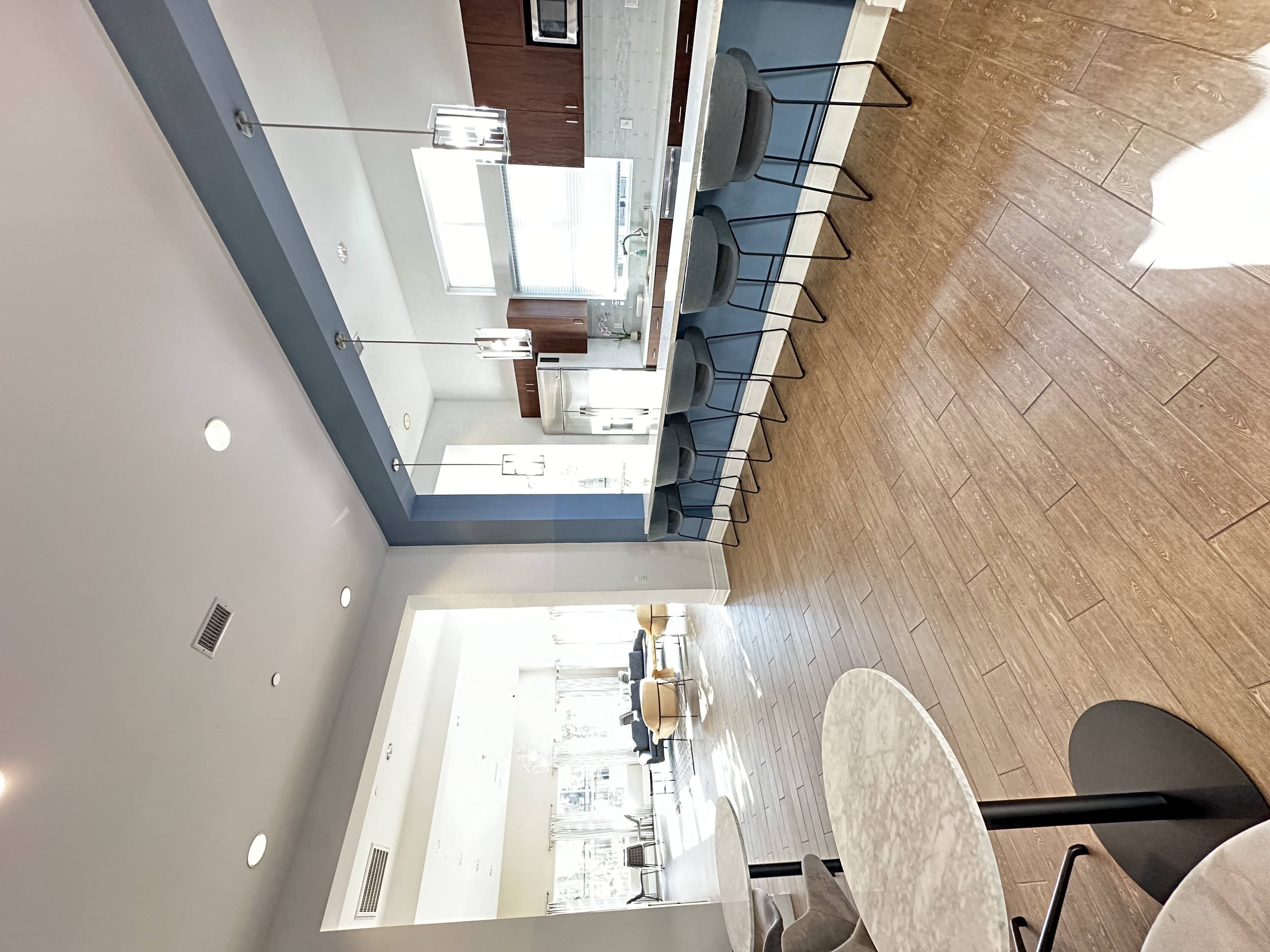 a view of an eating area in the clubhouse at The Bryant Apartments at Yorba Linda, California, 92887