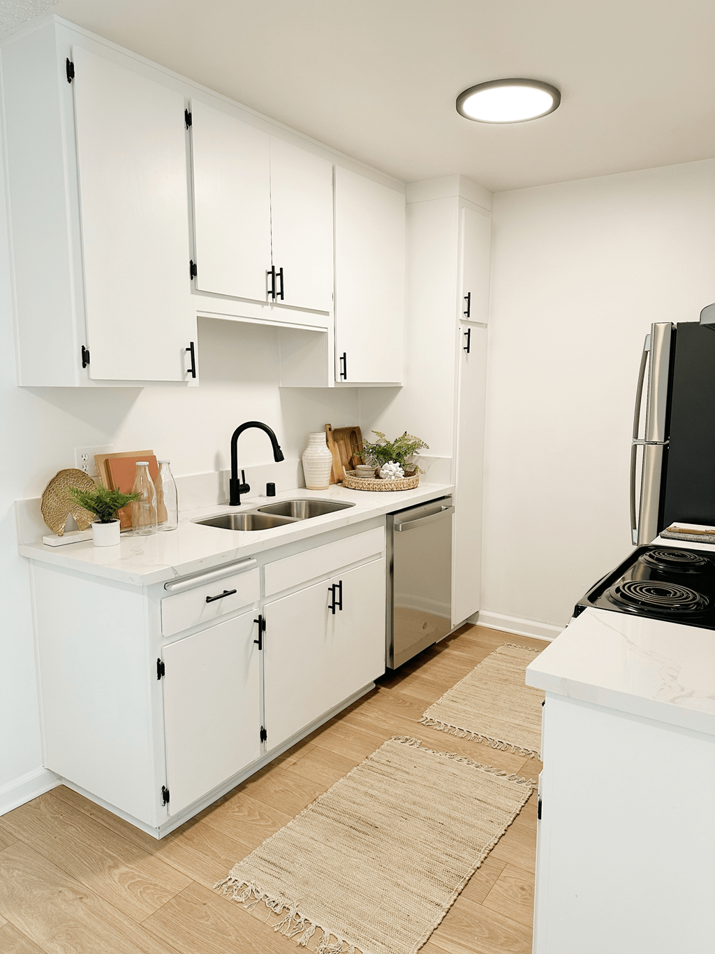  kitchen with white cabinets  at Mission Valley, San Diego, California