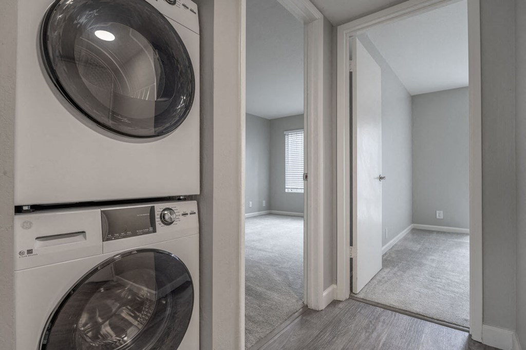 a white laundry room with a washer and dryer in it at Danville Park, Danville
