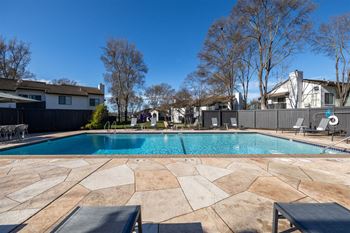 a swimming pool with a house in the background at Diablo Vista, California