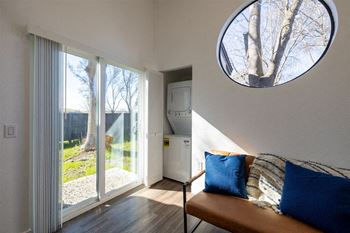 a living room with a large window and a couch at Diablo Vista, Livermore, California