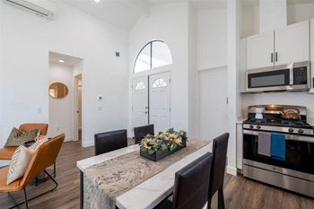 a kitchen and dining room with a table and chairs at Diablo Vista, Livermore