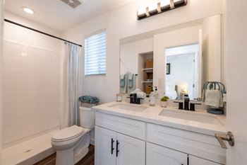 a bathroom with a sink and a toilet and a shower at Diablo Vista, Livermore, CA