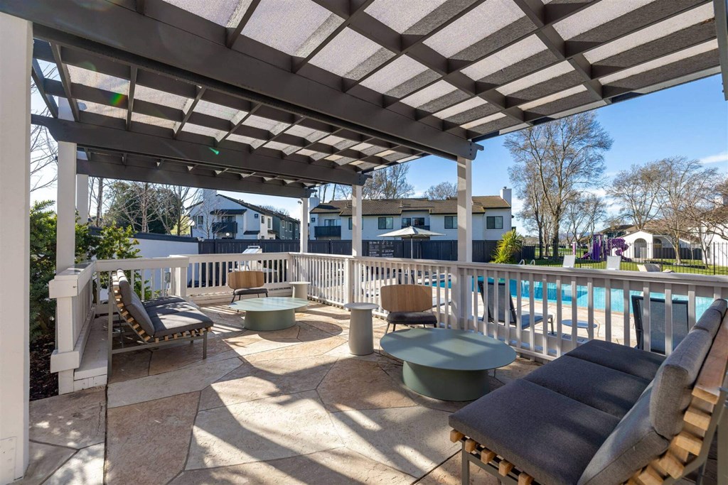 a patio with a pool and chairs and a pergola at Diablo Vista, California