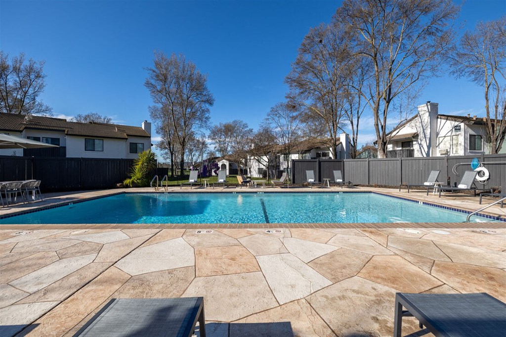 a swimming pool with a house in the background at Diablo Vista, Livermore, California