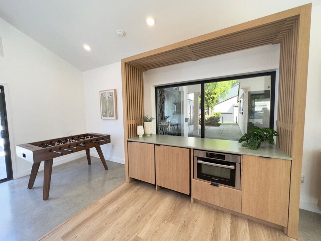 a game room with a foosball table and a large window at Diablo Vista, Livermore, CA, 94551