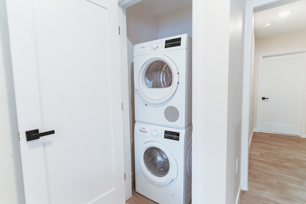   small laundry room with washer and dryer at The Flats on Addison, Sherman Oaks, CA 91423