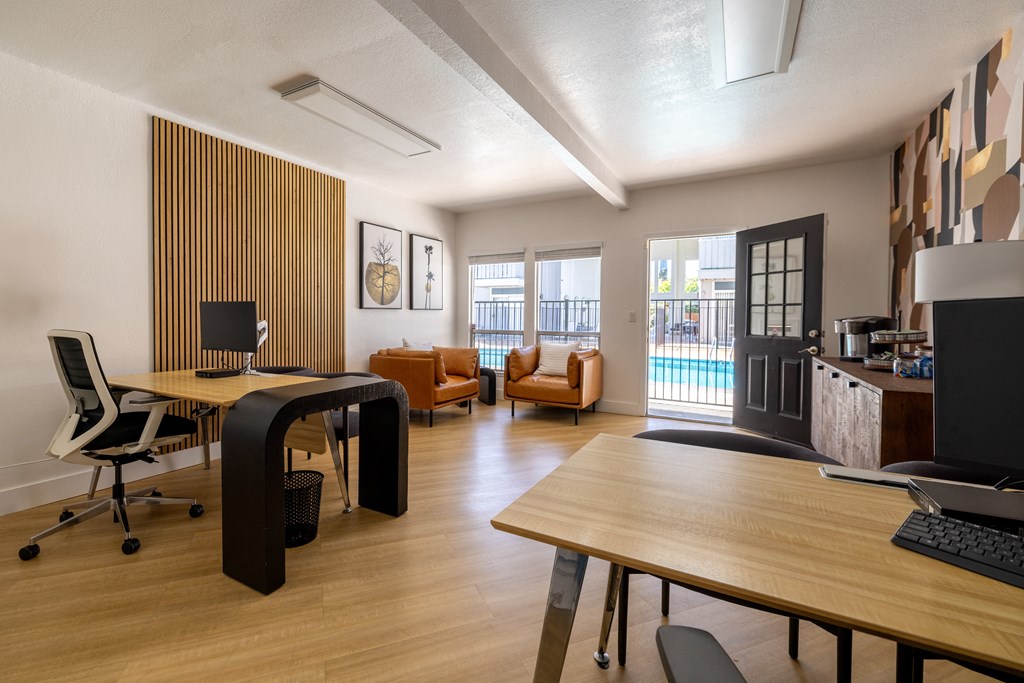 a home office with a desk and a computer on a table at Campbell West Apartments, California 95008