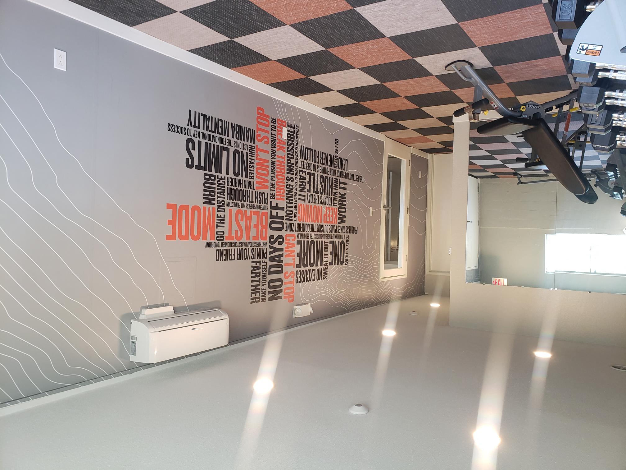 a gym with gym equipment at citra apartments