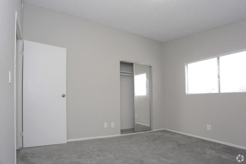 Carpeted Bedroom at The Marq Apartments LLC, California