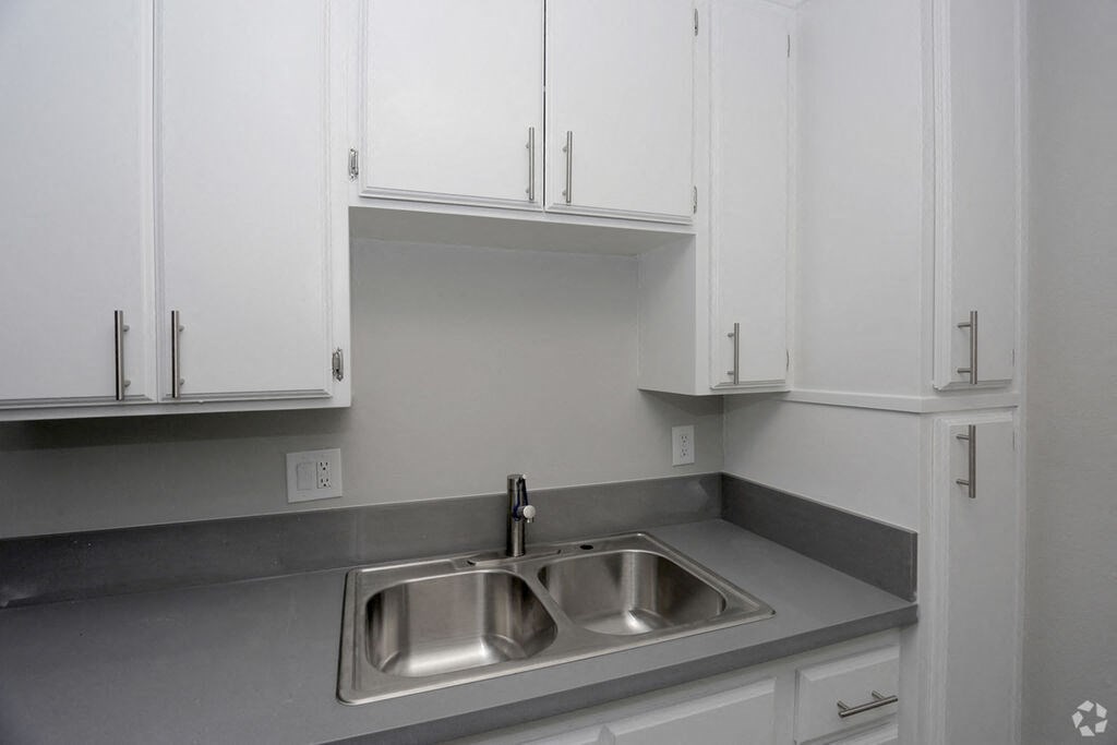 Sink With Faucet at The Marq Apartments LLC, Los Angeles