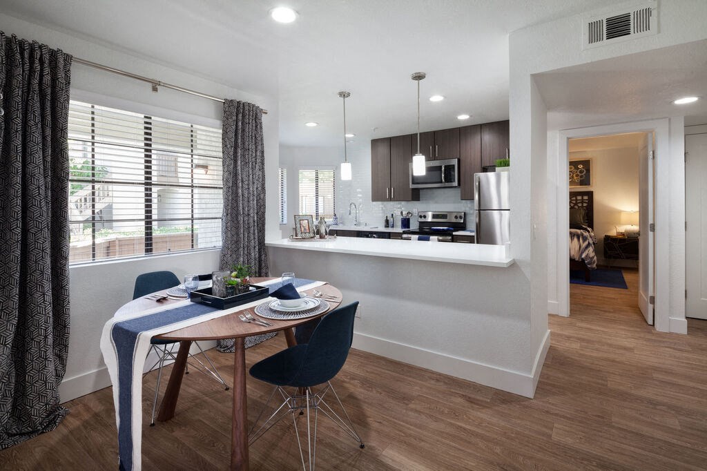 a kitchen and dining room with a table and chairsat The Bryant, Yorba Linda, CA 92887