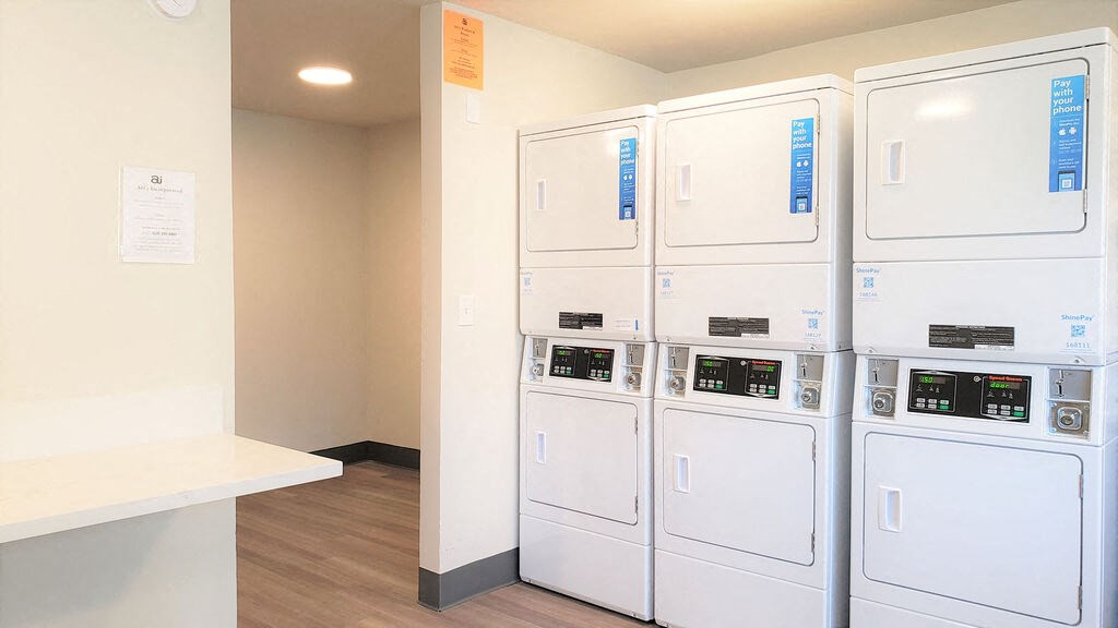Modern Laundry Room at Citra Apartments LLC, San Diego, California