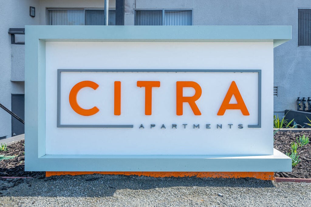 a sign in front of a building that says citra apartments at Citra Apartments LLC, California, 92107