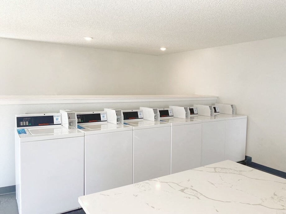 a bunch of microwaves are on display in a room at Latitude Apartments at Mission Valley, California, 92120