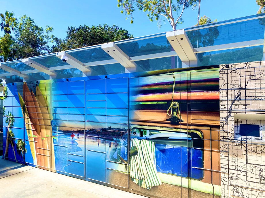 a bathroom with a colorful mural on the side of it at La Jolla Blue, San Diego, 92122