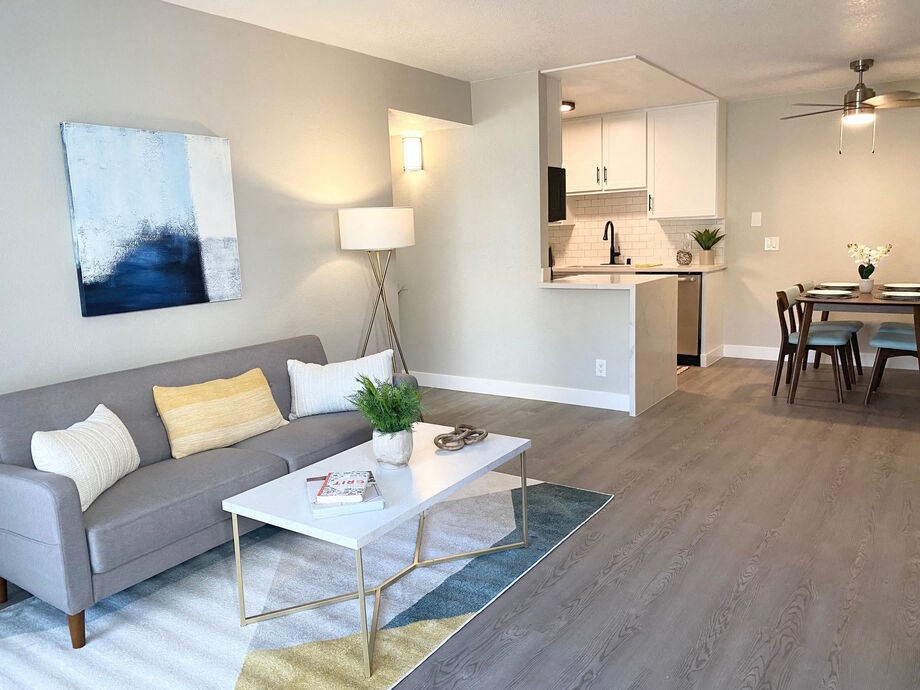 a living room with a couch and a table at La Jolla Blue, California, 92122