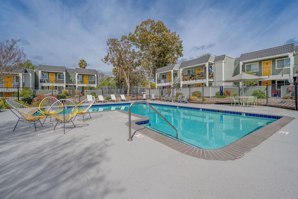 our apartments have a resort style pool and lounge chairs at Napa Green Apartments LLC, Napa California