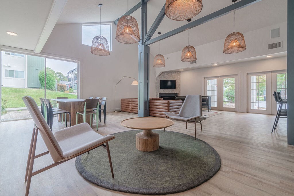 a living room and dining room with chairs and a table at Napa Green Apartments LLC, Napa California