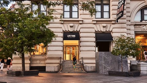 A building with a black awning that says at One West,  New York,10004