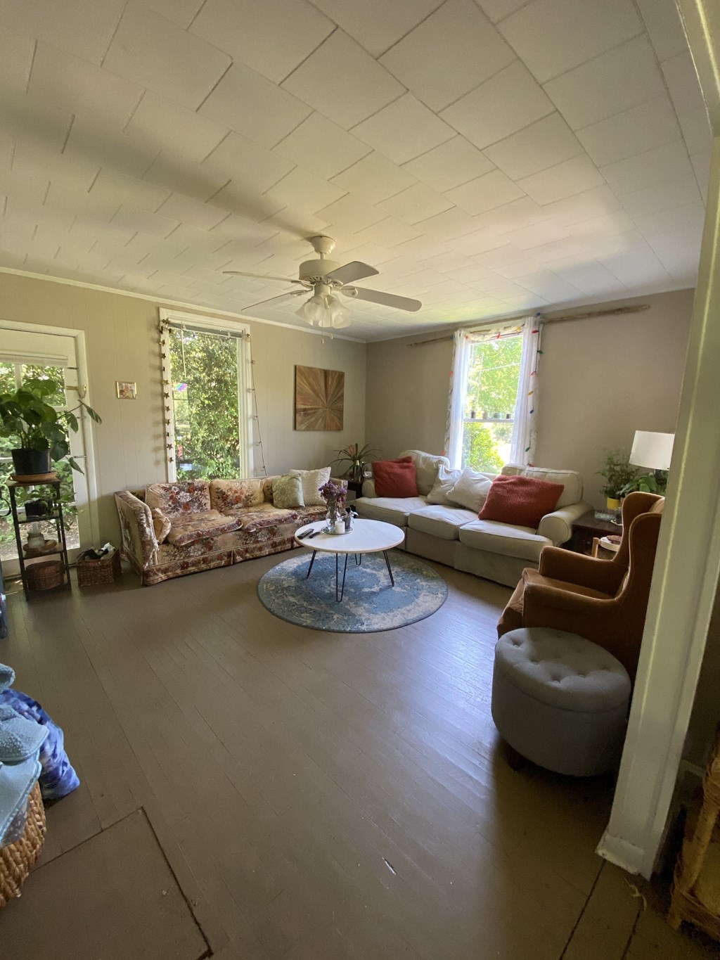 a living room with a couch and a table