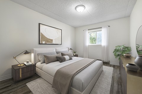 A bedroom with a large bed and a painting on the wall.