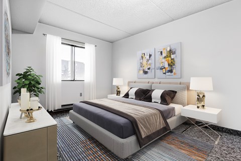 A bedroom with a large bed and a plant on a side table.