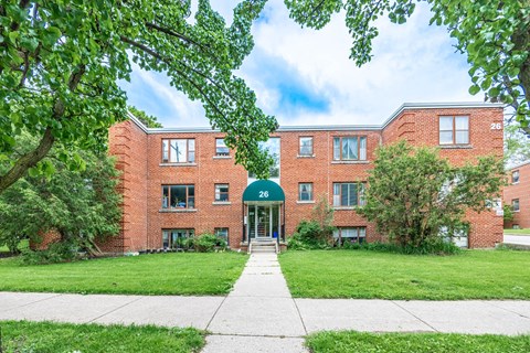 A red brick building with the number 28 on the front.