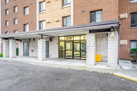The image shows a building with the number 609 on it.