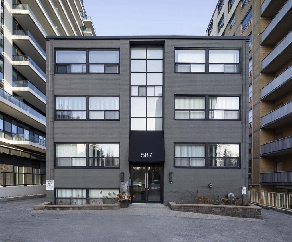 A grey building with the number 587 on the front.