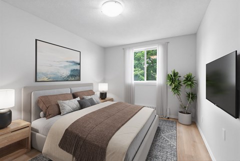 A bedroom with a large bed and a painting on the wall.