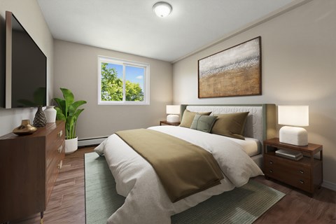 A bedroom with a large bed and a painting on the wall.