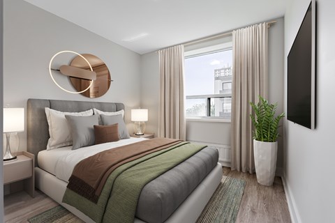 A modern bedroom with a large bed and a flat-screen TV mounted on the wall.