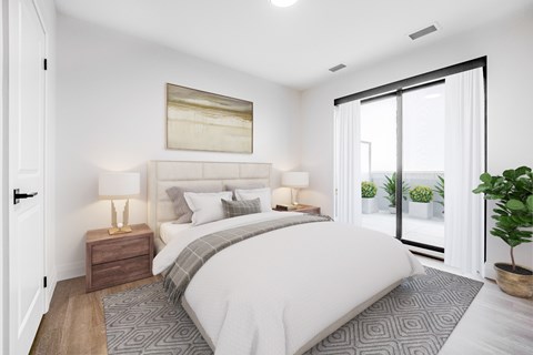 A bedroom with a large bed, a nightstand with two lamps, and a painting on the wall.