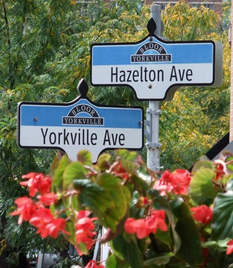 Two street signs for Yorkville and Hazelton Ave are on a pole.
