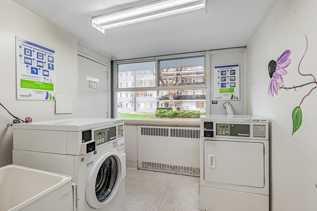 A laundry room with a washer and dryer.