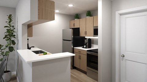 A kitchen with a white countertop and wooden cabinets.