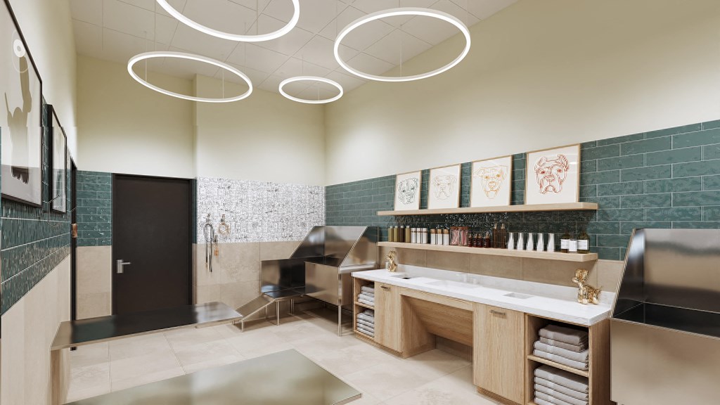 a bathroom with a vanity and a sink and a refrigerator