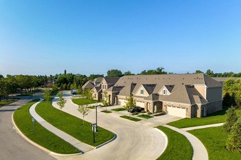 a large house with a street in front of it