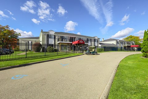 A sunny day at a residential area with a clear blue sky.