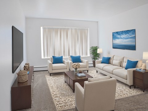 A living room with a large window, a sofa set, a coffee table, and a television.