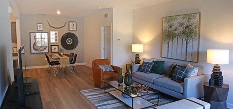 a living room with a couch and a table