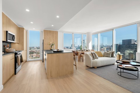 A modern kitchen with a view of the city.