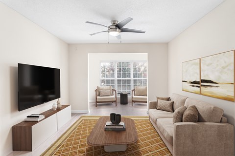 A living room with a brown couch, a coffee table, a flat screen TV, and a painting on the wall.