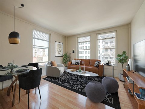 A living room with a black chair and a black table.