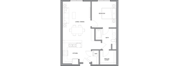 A floor plan of a house with a kitchen, living/dining area, and bathroom.
